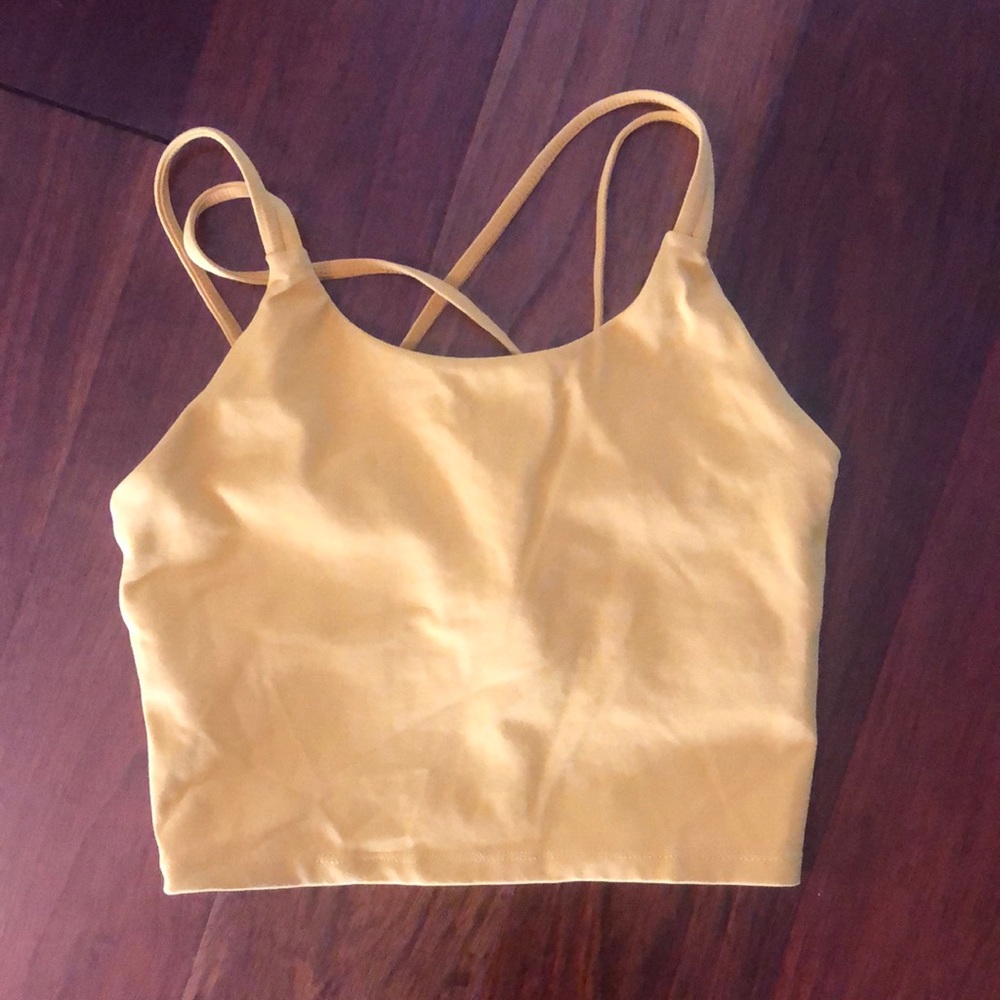 Cropped small yellow supportive work out top with crossed straps